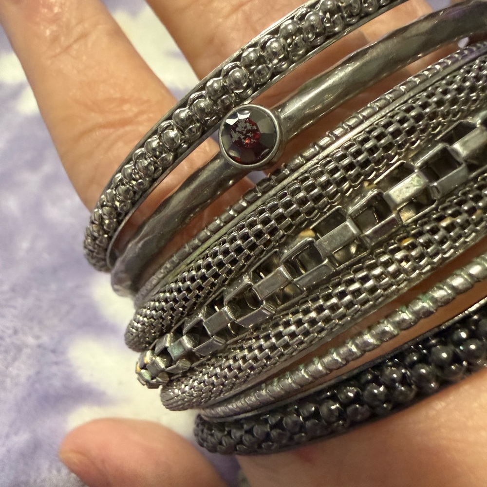 Stylish Silver and Black Bangle Set
You get all for one low price - Picture 8 of 12